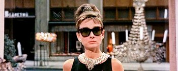 Audrey Hepburn como Holly Golightly