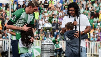 Franco Armani junto a René