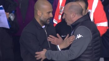 Pep Guardiola y Paul Cook,