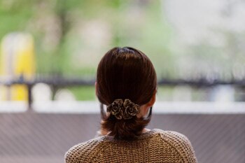 Mitsuko (no es su nombre real) prefiere no mostrar su rostro en la foto, pues teme que haya represalias por parte del líder norcoreano