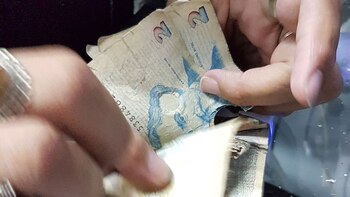 Los deteriorados billetes de 2