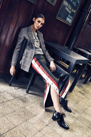 Buzo bordado ($ 1.299, Yagmour),