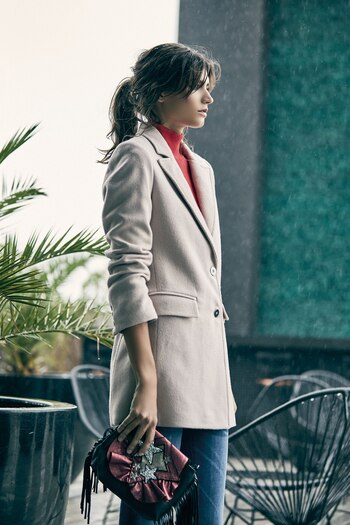 Saco de paño y suéter