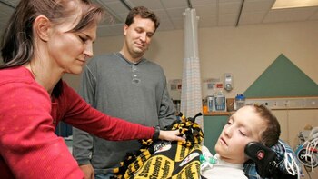 Beth, Kevin y Alex Malarkey.