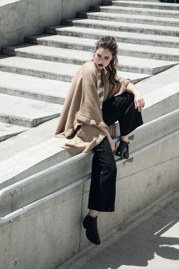 Poncho abierto tejido ($ 2.490,