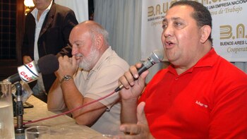Luis Farinello junto a Luis