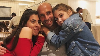 Willfredo Caballero junto a sus