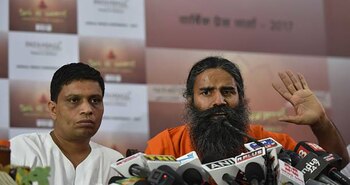 Acharya Balkrishna y Baba Ramdev