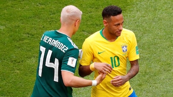 El saludo entre las dos figuras