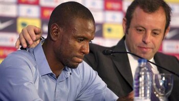 Éric Abidal junto al presidente