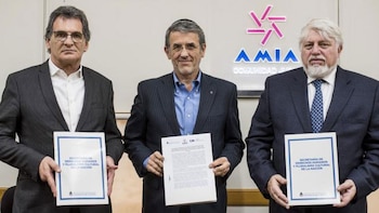 Avruj, Zbar y Werthein durante la firma del convenio