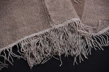 Poncho de llama, motivo ojo