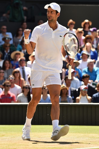 Serbia’s Novak Djokovic celebrates a