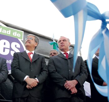 Claudio Uberti junto a Julio