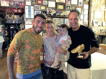 Carlos Tévez y Daniel Scioli,