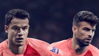 Phillipe Coutinho y Gerard Piqué