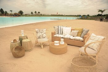 Sillón de ratán de tres cuerpos