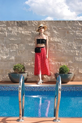 Top de cuerina elastizado y