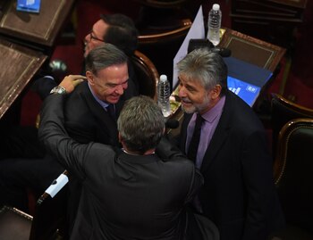 Miguel Ángel Pichetto junto a