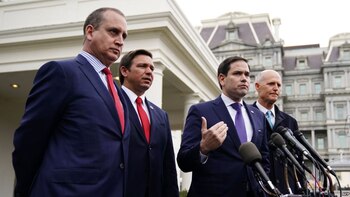 Marco Rubio (Centro), Rick Scott