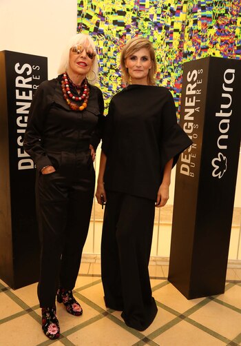 Min Agostini junto a la