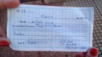 El recibo que le firmó