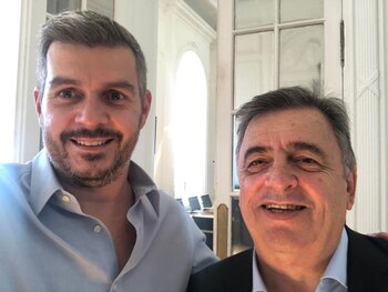 Marcos Peña, ayer, junto a