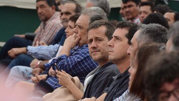 En la primera fila del