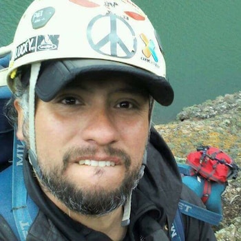 El escalador y guía de