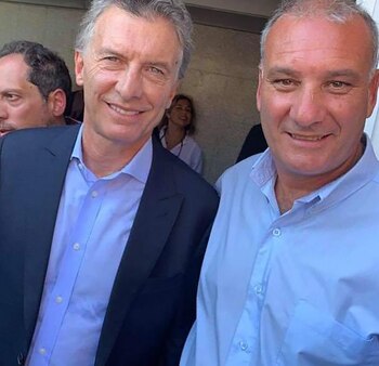 Gustavo Blanco junto al presidente