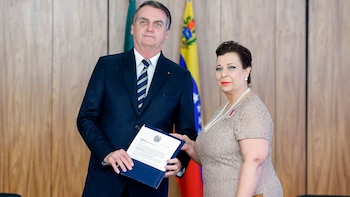 Jair Bolsonaro junto a María