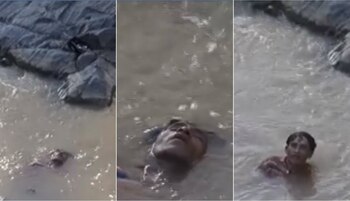 En un insólito hecho un hombre pasó la noche en el río Santa Rosa en El Salvador, todos pensaron que era un muerto cuando llegó la policía y se despertó dejando a todos sorprendidos Foto: Impresión de pantalla RB Noticias