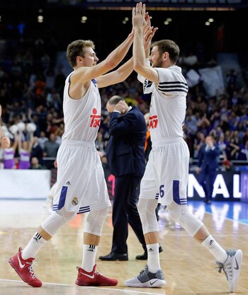 Andrés Nocioni y Luka Doncic