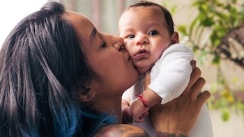 Lucero y Guillermo, su bebé.