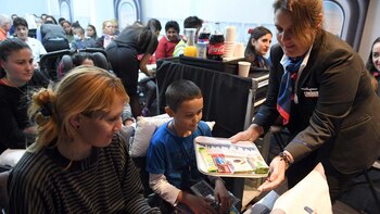 A cada viajero le daban